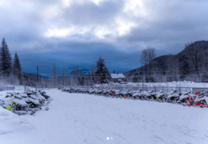 Plenty of snowmobile parking at Peaks Lodge in Revelstoke, BC