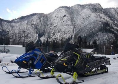 Sleds parked at at Peaks Lodge in Revelstoke, BC