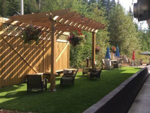 Outdoor lounging area at Peaks Lodge in Revelstoke, BC